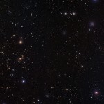A multitude of faint galaxies, small luminous dots scattered over the dark sky, was captured by the Wide Field Imager on the MPG/ESO 2.2-metre telescope at the La Silla Observatory in Chile. Images such as this one are powerful tools to understand how dark